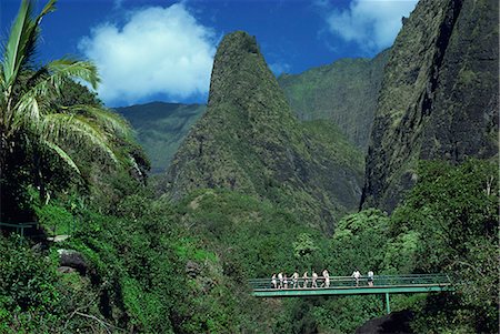 Tourists crossing bridge under the Maui Iao Needle, Hawaii, United States of America, North America Stock Photo - Rights-Managed, Code: 841-02708369
