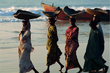 Women using turtle shells to carry fish on their heads, Puri, Orissa State, India, Asia Stock Photo - Rights-Managed, Code: 841-02708513
