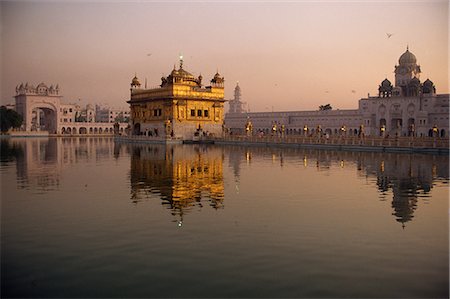 The Guru's Bridge over the Pool of Nectar, leading to the Golden Temple of Amritsar, Punjab State, India, sia Stock Photo - Rights-Managed, Code: 841-02708522