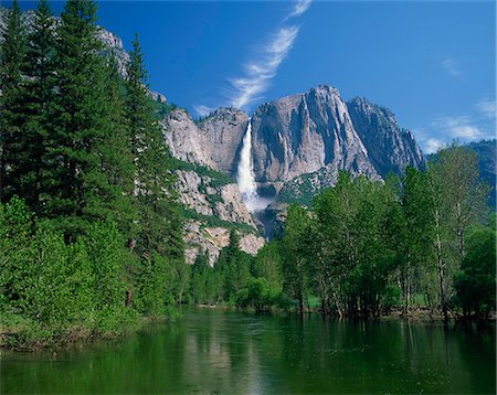 The Merced River swollen by summer snowmelt, with the Yosemite Falls in the background, in the Yosemite National Park, UNESCO World Heritage Site, California, United States of America, North America Stock Photo - Rights-Managed, Code: 841-02708621