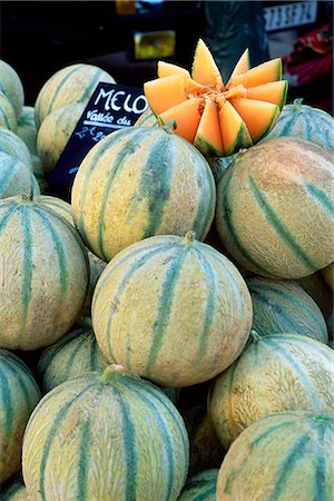 food markets in france - Melons for sale on market in the Rue Ste. Claire, Annecy, Haute-Savoie, Rhone-Alpes, France, Europe Stock Photo - Rights-Managed, Code: 841-02708806