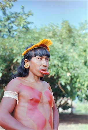 Suya Indian man with lip plate, Xingu, Brazil, South America (1971) Stock Photo - Rights-Managed, Code: 841-02709403