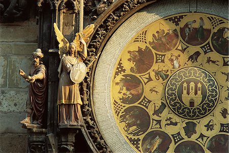 statue angel building - Close-up of the astronomical clock, Town Hall, Old Town Square, Prague, Czech Republic, Europe Stock Photo - Rights-Managed, Code: 841-02709509