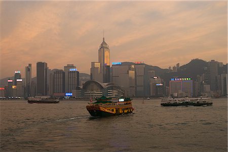 A Chinese style tourist boat sails in Victoria Harbour, Hong Kong, China, Asia Stock Photo - Rights-Managed, Code: 841-02709779