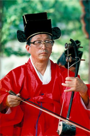 picture of man with red bow - Confucian ceremony, Chon Myo shrine, Seoul, South Korea, Asia Stock Photo - Rights-Managed, Code: 841-02703983