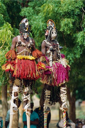 simsearch:400-05721339,k - Dogon dancers on stilts, Sangha, Mali, Africa Fotografie stock - Rights-Managed, Codice: 841-02714181