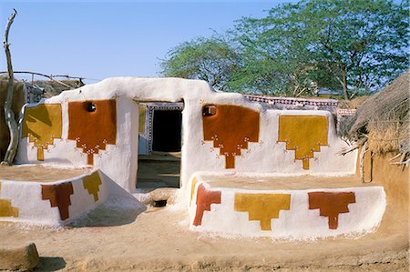 Geometric designs on walls of a village house, near Jaisalmer, Rajasthan state, India, Asia Fotografie stock - Rights-Managed, Codice: 841-02714209