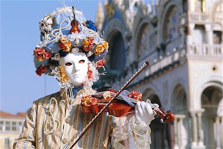 european traditional musical instruments - Person wearing masked carnival costume, Venice Carnival, Venice, Veneto, Italy Stock Photo - Rights-Managed, Code: 841-02714238