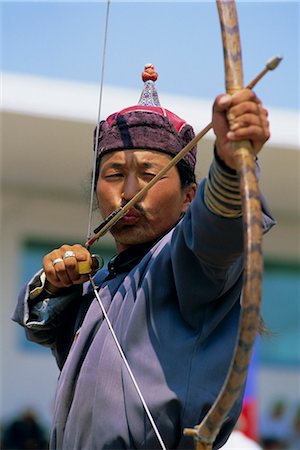 picture of man with arrow in head - Archer at the Naadam Festival, Ulaan Baatar (Ulan Bator), Mongolia, Asia Stock Photo - Rights-Managed, Code: 841-02714366