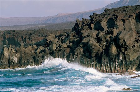 Volcanic rocks and sea, Parque Nacional de Timanfaya, Lanzarote, Canary Islands, Spain, Atlantic, Europe Stock Photo - Rights-Managed, Code: 841-02715022