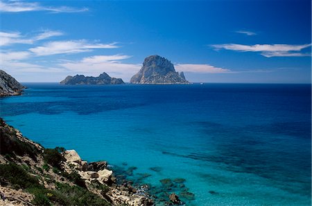 stones sand horizon - The rocky islet of Es Vedra, near Sant Antoni, Ibiza, Balearic Islands, Spain, Mediterranean, Europe Stock Photo - Rights-Managed, Code: 841-02715082