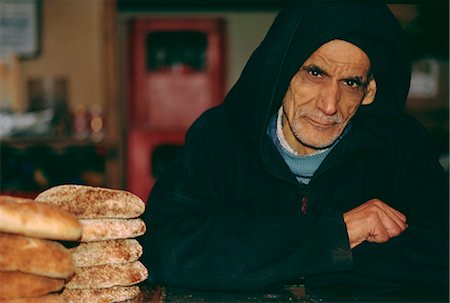 Portrait of an elderly man selling bread, Marrakech, Morocco Stock Photo - Rights-Managed, Code: 841-02715998