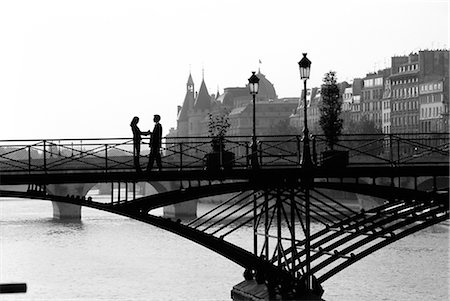 paris in black and white - Couple on bridge, Paris, France Stock Photo - Rights-Managed, Code: 841-02716491