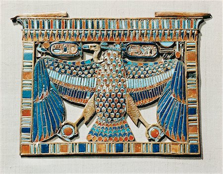 Pectoral decorated with the vulture of Upper Egypt, made of gold cloisonne inlaid with glass paste, from the tomb of the pharaoh Tutankhamun, discovered in the Valley of the Kings, Thebes, Egypt, North Africa, Africa Stock Photo - Rights-Managed, Code: 841-02717789