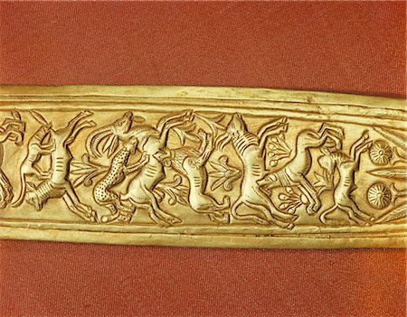 simsearch:841-02824459,k - Detail of the gold sheath of one of the king's daggers showing animals in a hunting scene, from the tomb of the pharaoh Tutankhamun, discovered in the Valley of the Kings, Thebes, Egypt, North Africa, Africa Foto de stock - Con derechos protegidos, Código: 841-02717822