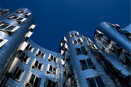 The Neuer Zollhof building by Frank Gehry, at the Medienhafen, Dusseldorf, Nord Rhine-Westphalia, Germany, Europe Fotografie stock - Rights-Managed, Codice: 841-02718406