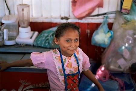 Little girl, Milagro, shows off her dimples, on border with Honduras, Nicaragua, Central America Stock Photo - Rights-Managed, Code: 841-02718639