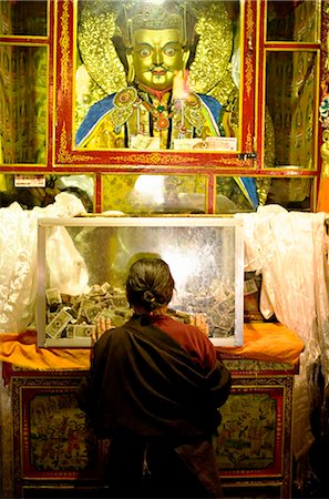 Woman pays respect at Meru Nyingba Buddhist monastery, Bharkor, Lhasa, Tibet, China, Asia Stock Photo - Rights-Managed, Code: 841-02718679