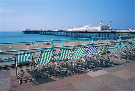 england brighton not people not london not scotland not wales not northern ireland not ireland - Deckchairs above the beach and the Palace Pier at Brighton, Sussex, England, United Kingdom, Europe Stock Photo - Rights-Managed, Code: 841-02710438