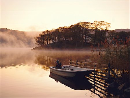 derwentwater - Early morning mist and boat, Derwent Water, Lake District, Cumbria, England Stock Photo - Rights-Managed, Code: 841-02710715