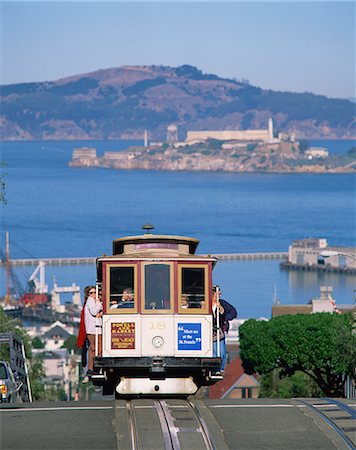 san francisco cable cars - Tram on Russian Hill with view over Alcatraz, San Francisco, California, United States of America, North America Stock Photo - Rights-Managed, Code: 841-02710719