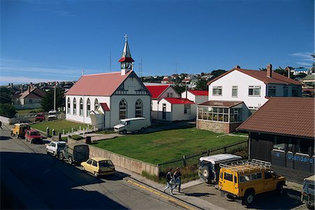 stanley cities photo - The Roman Catholic cathedral and houses in the town of Stanley, capital of the Falkland Islands, South America Foto de stock - Con derechos protegidos, Código: 841-02710756