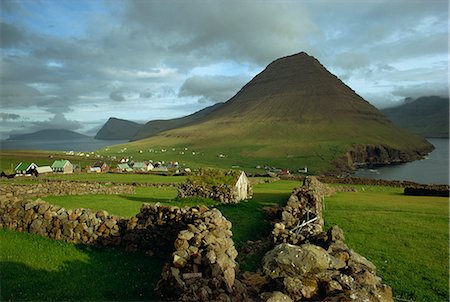faroe islands - Landscape containing dry stone walls and a small settlement, Faroe Islands, Denmark, Europe Stock Photo - Rights-Managed, Code: 841-02710758