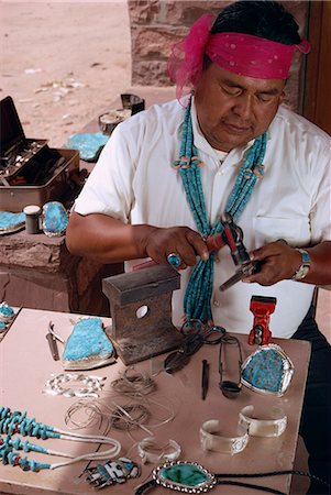 Indian craftsman making turquoise Zuni jewellery, New Mexico, United States of America, North America Fotografie stock - Rights-Managed, Codice: 841-02711028