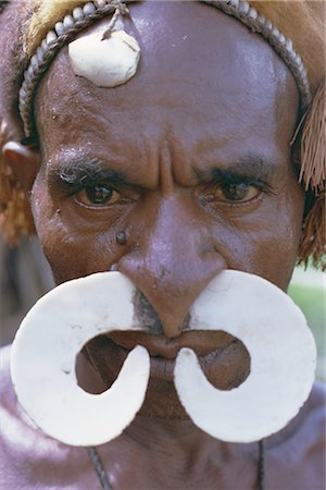 Portrait of an Asmat man with nose ornament, Papua New Guinea, Pacific Foto de stock - Con derechos protegidos, Código: 841-02711510