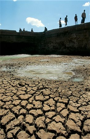 fango arido - Water reservoir dried up, Kebri Beyah, Ethiopia, Africa Fotografie stock - Rights-Managed, Codice: 841-02711649