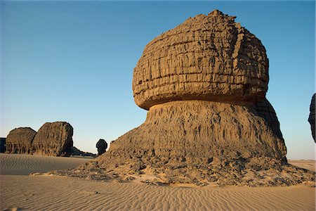 Wind eroded pinnacle rock showing strata, Tamegaout, Algeria, North Africa, Africa Stock Photo - Rights-Managed, Code: 841-02711908