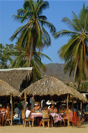 Tourists at a cafe on the beach at Acapulco, Mexico, North America Foto de stock - Con derechos protegidos, Código: 841-02712141