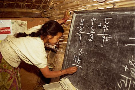 simsearch:841-02712162,k - Woman writing on a blackboard in a female literacy class at Dhankuta in Nepal, Asia Fotografie stock - Rights-Managed, Codice: 841-02712177