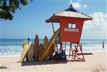 simsearch:841-02824799,k - Surfboards stacked waiting for hire at Kuta beach on the island of Bali, Indonesia, Southeast Asia, Asia Stock Photo - Rights-Managed, Code: 841-02712182