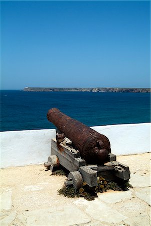 sagres - Fortaleza de Sagres, old cannon facing Cabo de Sao Vicente, the most westerly point in Europe, Algarve, Portugal Stock Photo - Rights-Managed, Code: 841-02712987