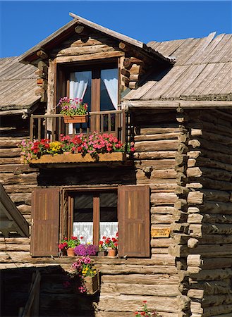 simsearch:841-06499990,k - Close up of the exterior of a wooden house with window boxes in St. Veran in the Haute Alpes in Provence, France, Europe Stock Photo - Rights-Managed, Code: 841-02713549