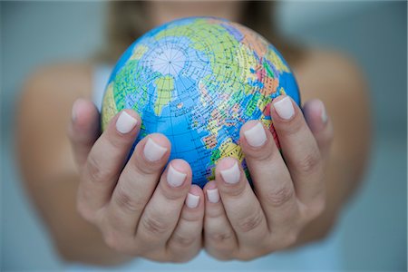 fragile world - Woman's hands holding world globe Stock Photo - Rights-Managed, Code: 841-02720804