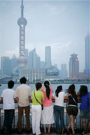 pudong district - People on the Bund looking at the Oriental Pearl Tower in Pudong District, Shanghai, China, Asia Stock Photo - Rights-Managed, Code: 841-02720870