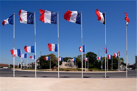 French flags and modern sculpture, Place de la Republique, Reims, Marne, Champagne-Ardenne, France, Europe Stock Photo - Rights-Managed, Code: 841-02721602