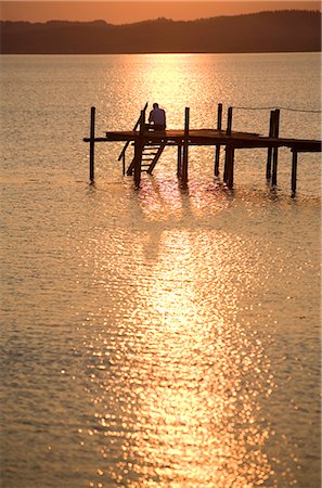 silhouette people sitting on a dock - Sunset on the beach, Ebeltoft, Denmark, Scandinavia, Europe Stock Photo - Rights-Managed, Code: 841-02721807