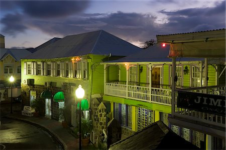 piccadilly circus - Colourful buildings surrounding the central Piccadilly Circus, illuminated at dusk, Basseterre, St. Kitts, Leeward Islands, West Indies, Caribbean, Central America Fotografie stock - Rights-Managed, Codice: 841-02722161