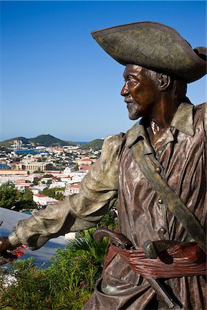 saint thomas - Sculpture in Blackbeard's Castle, one of four National Historic sites in the US Virgin Islands, with Charlotte Amalie in the background, St. Thomas, U.S. Virgin Islands, West Indies, Caribbean, Central America Foto de stock - Direito Controlado, Número: 841-02722219