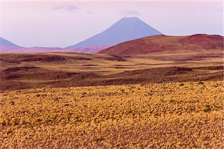 desert environmental concerns - The altiplano at an altitude of over 4000m looking towards Volcan Chiliques at 5727m, Los Flamencos National Reserve, Atacama Desert, Antofagasta Region, Norte Grande, Chile, South America Stock Photo - Rights-Managed, Code: 841-02722349