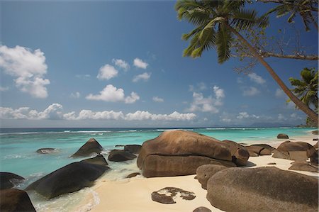 stones sand horizon - Rocks and palm tree on tropical beach, Seychelles, Indian Ocean, Africa Stock Photo - Rights-Managed, Code: 841-02722590