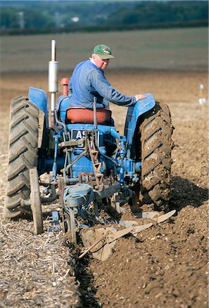 plows on tractor - Farmer ploughing near Sonning Common, Oxfordshire, England, United Kingdom, Europe Stock Photo - Rights-Managed, Code: 841-02722741