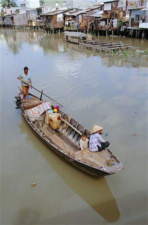 simsearch:841-03034963,k - Boat on the Kinh Ben Nghe, a tributary of the Saigon River, in downtown Ho Chi Minh City (formerly Saigon), Vietnam, Indochina, Southeast Asia, Asia Foto de stock - Con derechos protegidos, Código: 841-02722827