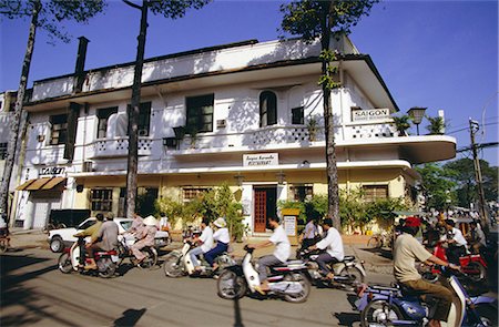 simsearch:841-02722827,k - Street corner with karaoke restaurant in downtown area, Ho Chi Minh City (formerly Saigon), Vietnam, Indochina, Southeast Asia, Asia Stock Photo - Rights-Managed, Code: 841-02722832