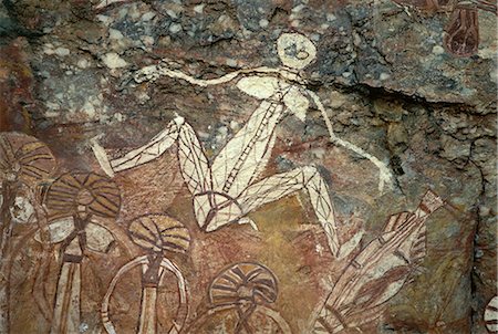 Barrginj, wife of Namarrgon the Lightning Man, one of the supernatural ancestors depicted at the aboriginal rock art site at Nourlangie Rock in Kakadu National Park, UNESCO World Heritage Site, Northern Territory, Australia, Pacific Fotografie stock - Rights-Managed, Codice: 841-02722975