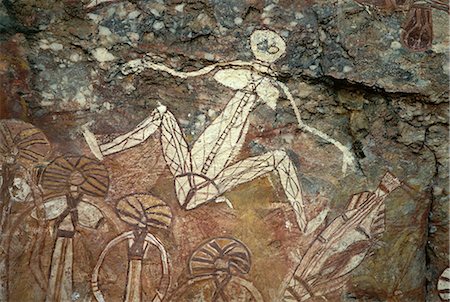 simsearch:841-09108168,k - Barrginj, femme de Namarrgon l'homme de la foudre, un des ancêtres surnaturels décrits sur le site d'art rupestre aborigène à Nourlangie Rock dans le Parc National de Kakadu, patrimoine mondial UNESCO, Northern Territory, Australie, Pacifique Photographie de stock - Rights-Managed, Code: 841-02722975