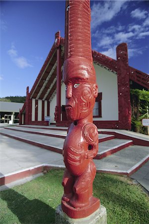 Carved wooden figure, or poupou, replica village, Maori Arts and Crafts Institute, Whakarewarewa thermal and cultural area, Rotorua, South Auckland, North Island, New Zealand, Pacific Stock Photo - Rights-Managed, Code: 841-02723024
